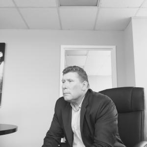 John Salkowski talking with a reporter